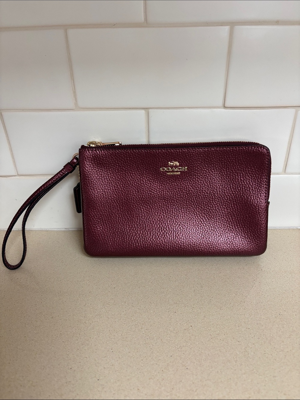 Coach Pebbled Leather Wristlet in Burgundy